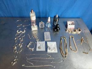 lot 29 image: Lot of Perfume and Jewelry