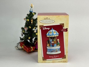 lot 5 image: 2004 Hallmark Keepsake Walt Disney Small World Christmas Ornaments