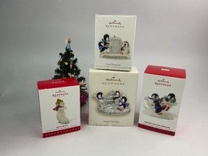 lot 29 image: 4 Hallmark Keepsake Christmas Ornaments