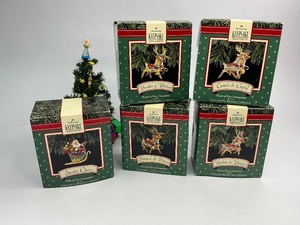 lot 76 image: 1992 Hallmark Keepsake Christmas Ornament Santa and His Reindeer Collection