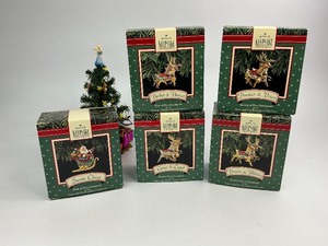 lot 91 image: 1992 Hallmark Keepsake Christmas Ornament Santa and His Reindeer Collection