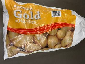 lot 104 image: 10 lb Bag of Premium Gold Potatoes