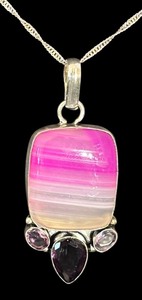 lot 73R image: Sterling Silver Necklace with Pink Banded Stone Pendant and Faceted Accents