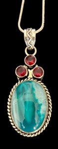 lot 85R image: Sterling Silver 24 Inch Necklace with 2.5 Inch Turquoise Colored Agate and Red Gem Pendant