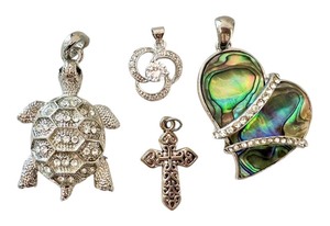 lot 78J image: Sterling Silver Cubic Zirconia Pendant and Assorted Fashion Pendants Set