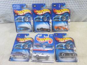 lot 103 image: (EC1) Assorted Hot Wheels in Packag...