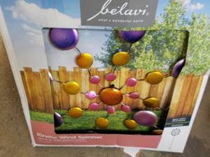 lot 107 image: Belavi Kinetic Wind Spinner 22 Dia...