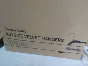 lot 192 image: 30 Kids Size Pastel Velvet Hangers...