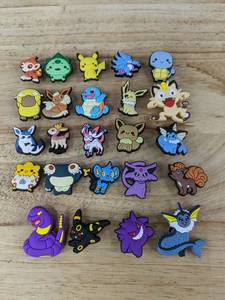 lot 76 image: 24 Pokemon Croc Shoe Charms - Brand New