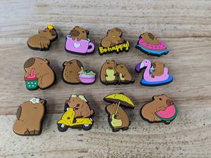 lot 103 image: 12 Capybara Croc Shoe Charms - Brand New