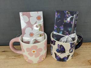 lot 151 image: 2 Mugs, 14.2 oz, Notepad, and Pen Gift Sets Flower and Butterfly Designs - Brand New