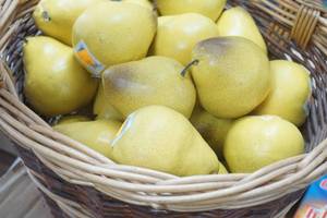 lot 108 image: Ceramic Pears (6 cases and a basket)