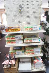 lot 123 image: Keychains, Minnesota Postcards, Key Fobs, RWB Decor Chairs