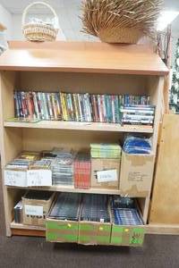 lot 169 image: Books, DVDs, CDs, CD Cases, Pins, Straw Hats