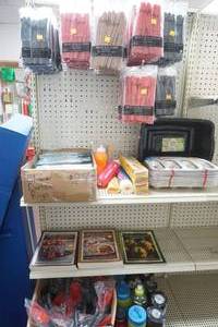 lot 203 image: Plastic Cutlery, Dish Pan, Twinkie Pans, Cook Books, Rubber Spoons, Water Bottles, Shower Curtain Rings