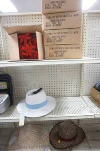 lot 204 image: Red Poinsettia Cases and Womens Sun Hats