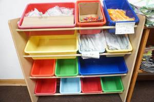 lot 212 image: Toy Organizer Bin and Contents