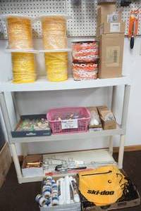 lot 239 image: 3-Tier Rack and Contents (rope, shot glasses, fishing stuff)