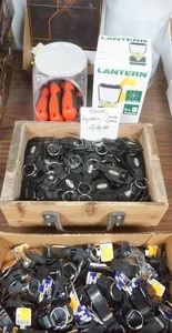 lot 254 image: Keychains, Lantern, bottle openers, bottle opener keychains, knife sharpeners