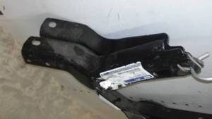 lot 24 image: Ford 8L8Z-16A023-A Bracket 2008-2012 Ford (2)