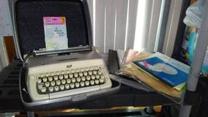 lot 256 image: Vintage Smith Corona Typewriter and more.