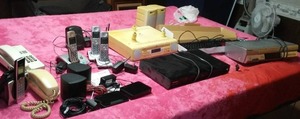 lot 321 image: Large Lot Electronics. Rear Speaker System, Phones VHS, DVD, Rewinders and More.