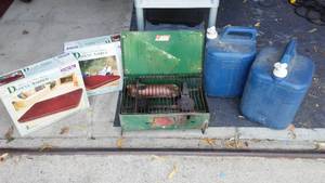 lot 282 image: Coleman Water 5 gal. (2), Queen Air Bed NEW (2) and more.