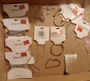 lot 210 image: Vintage Costume Jewelry, Handheld Sewing machine and More.