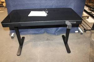lot B-2 image: Adjustable Black Standing Desk with Drawer and Electronic Controls