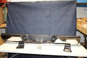 lot 11 image: Chrome Rear Step Bumper with Mounting Brackets and Hardware