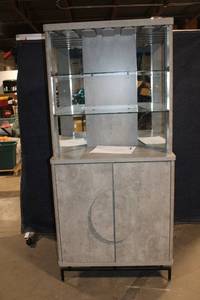 lot 18 image: Modern Gray Bar Cabinet with Glass Shelves and Wine Storage