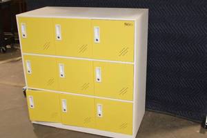 lot 21 image: Metelior 9-Door Steel Locker Cabinet with Yellow Doors