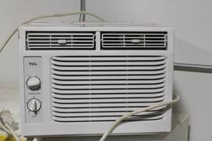 lot 57 image: TCL Window Air Conditioner with Manual Controls