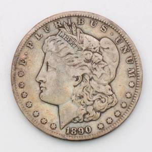 lot 14 image: 1890-CC Morgan Silver Dollar