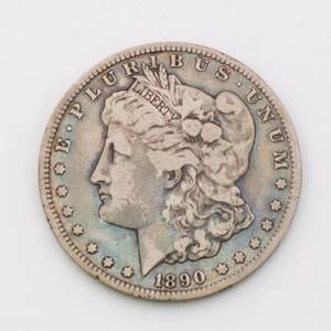 lot 12 image: 1890-CC Morgan Silver Dollar