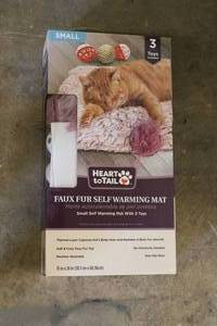 lot 10 image: New size small Heart to Tail self w...