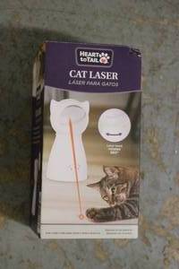 lot 21 image: New Heart To Tail Cat laser toy...