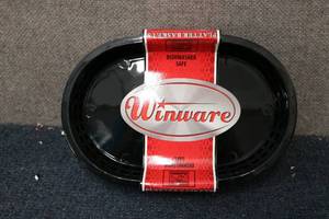 lot 110 image: 12 Pack of forest green oval servin...