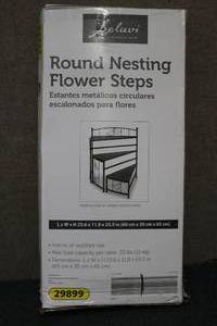 lot 140 image: Round Nesting flower steps to displ...