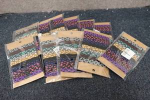 lot 153 image: 11-20 packs of elastic hair ties...