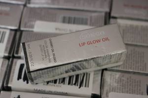 lot 164 image: 21 tubes of SOKGO LIP OIL...