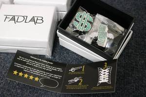 lot 184 image: 24 FADLAB shoe lace rings...
