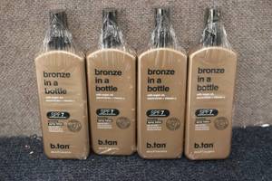 lot 192 image: 4 b.tan bronze in a bottle spray lo...