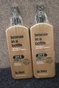 lot 193 image: 2 b.tan bronze in a bottle spray lo...
