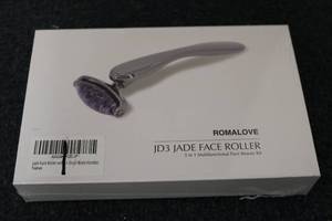 lot 230 image: Jade Face Roller...