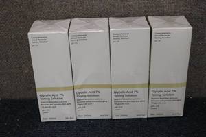 lot 242 image: 4 Bottles of Glycolic Acid 7% Tonin...
