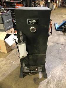 lot 15 image: Masterbuilt 30 in. Dual Fuel Propane Gas and Charcoal Smoker in Black, 731 sq. in. of Cooking Space  Damaged Customer Returns See Pictures