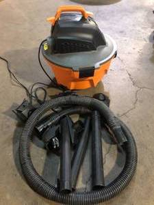lot 52 image: RIDGID 6 Gal. 3.5 Peak HP NXT Shop Vacuum Wet Dry Vac with General Debris Filter, Locking Hose and Attachments HD06001   Customer Returns See Pictures