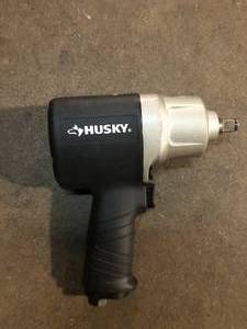 lot 64 image: Husky 800 ft.lbs. 12 in. Impact Wrench  Customer Returns See Pictures