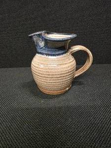 lot 11 image: Vintage handmade glazed stoneware pitcher